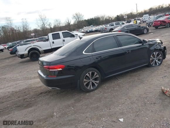 2021 Volkswagen Passat 2.0T SE with VIN 1VWSA7A34MC019031, listed as a IAAI auction lot 41150221 with 50,796 mi miles. Bid and sale history available at carsss.com. Image 4.
