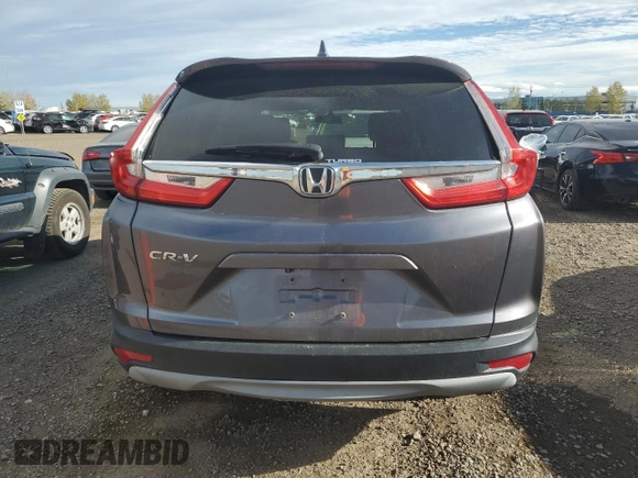 2017 Honda CR-V LX with VIN 2HKRW1H36HH000058, listed as a Copart auction lot 74264374 with 118,314 mi miles and Salvage Title. Bid and sale history available at carsss.com. Image 6.
