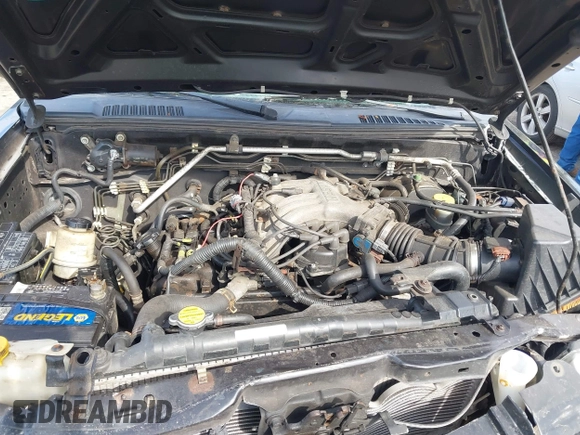 2002 Nissan Frontier XE z VIN 1N6ED26Y62C390281, wystawiony jako IAAI lot #41815164 z przebiegiem 145 438 mil mil oraz . Historia ofert i sprzedaży dostępna na DreamBid. Obrazek 10.