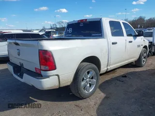 2014 Ram 1500 Express with VIN 1C6RR6KT8ES101426, listed as a IAAI auction lot 41694226 with 163,762 mi miles. Bid and sale history available at carsss.com. Image 4.