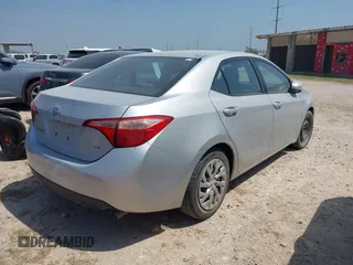 2018 Toyota Corolla L with VIN 2T1BURHE1JC986244, listed as a IAAI auction lot 41942626 with Not provided miles and . Bid and sale history available at DreamBid. Image 4.