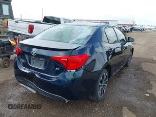 2017 Toyota Corolla L with VIN 5YFBURHE5HP685616, listed as a IAAI auction lot 42388072 with 144,356 mi miles and . Bid and sale history available at DreamBid. Image 6.