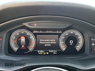 2020 Audi Q7 Premium z VIN WA1AJAF7XLD011977, wystawiony jako Copart lot #70385804 z przebiegiem 87 468 mil mil oraz Szkoda całkowita • Salvage title. Historia ofert i sprzedaży dostępna na DreamBid. Obrazek 9.