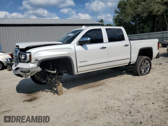 2017 GMC Sierra 1500 Denali z VIN 3GTU2PEJ2HG433669, wystawiony jako Copart lot #57460285 z przebiegiem 131 113 mil mil oraz Szkoda całkowita • Salvage title. Historia ofert i sprzedaży dostępna na DreamBid. Obrazek 1.