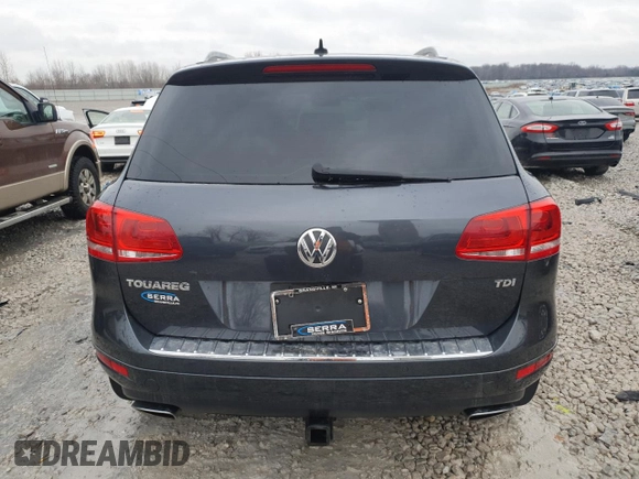 2012 Volkswagen Touareg Sport z VIN WVGFK9BP6CD005005, wystawiony jako Copart lot #46802355 z przebiegiem 141 430 mil mil oraz Czysty tytuł • Clean title. Historia ofert i sprzedaży dostępna na DreamBid. Obrazek 6.