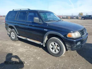 2002 Mitsubishi Montero Sport ES with VIN JA4LS21H72J054989, listed as a IAAI auction lot 41067504 with 335,479 mi miles. Bid and sale history available at carsss.com. Image 1.