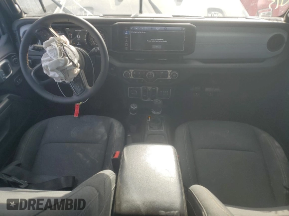 2024 Jeep Wrangler Sport S with VIN 1C4PJXDG9RW204575, listed as a Copart auction lot 46354145 with 29,874 mi miles and Salvage title. Bid and sale history available at DreamBid. Image 8.