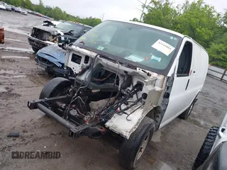 2014 Chevrolet Express Cargo with VIN 1GCWGFCA2E1198370, listed as a IAAI auction lot 42143804 with Not provided miles and . Bid and sale history available at DreamBid. Image 16.