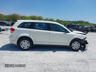 2015 Dodge Journey SE z VIN 3C4PDCAB7FT572716, wystawiony jako IAAI lot #42010091 z przebiegiem 186 489 mil mil oraz . Historia ofert i sprzedaży dostępna na DreamBid. Obrazek 12.