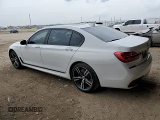 2017 BMW 7 Series 750i with VIN WBA7F0C5XHGM21437, listed as a Copart auction lot 55671543 with 65,085 mi miles. Bid and sale history available at carsss.com. Image 2.