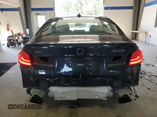 2018 BMW 5 Series 540i xDrive with VIN WBAJE7C56JWC57314, listed as a Copart auction lot 60610715 with 73,015 mi miles and Salvage title. Bid and sale history available at DreamBid. Image 6.