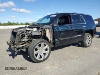2015 Cadillac Escalade Luxury z VIN 1GYS4BKJ3FR233402, wystawiony jako Copart lot #56347215 z przebiegiem 94 595 mil mil oraz Szkody całkowita. Historia ofert i sprzedaży dostępna na DreamBid. Obrazek 1.