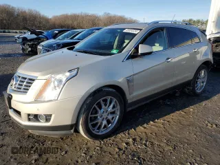 2014 Cadillac SRX Premium Collection z VIN 3GYFNGE34ES687663, wystawiony jako Copart lot #85854534 z przebiegiem 193 653 mil mil oraz Szkody całkowita. Historia ofert i sprzedaży dostępna na DreamBid. Obrazek 1.