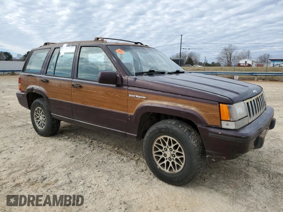 1993 Jeep Grand Wagoneer z VIN 1J4GZ88Y6PC711184, wystawiony jako Copart lot #46785895 z przebiegiem 280 127 mil mil oraz Czysty tytuł • Clean title. Historia ofert i sprzedaży dostępna na DreamBid. Obrazek 4.