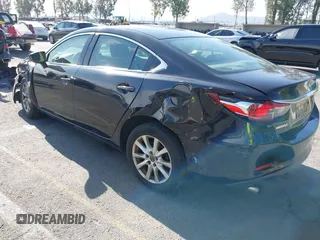 2016 Mazda 6 i Sport with VIN JM1GJ1U51G1445925, listed as a IAAI auction lot 41980386 with Not Provided miles and . Bid and sale history available at DreamBid. Image 3.