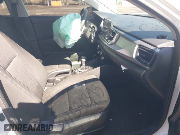 2022 Kia Rio S with VIN 3KPA25AD5NE458130, listed as a IAAI auction lot 41530395 with 33,154 mi miles and . Bid and sale history available at DreamBid. Image 5.