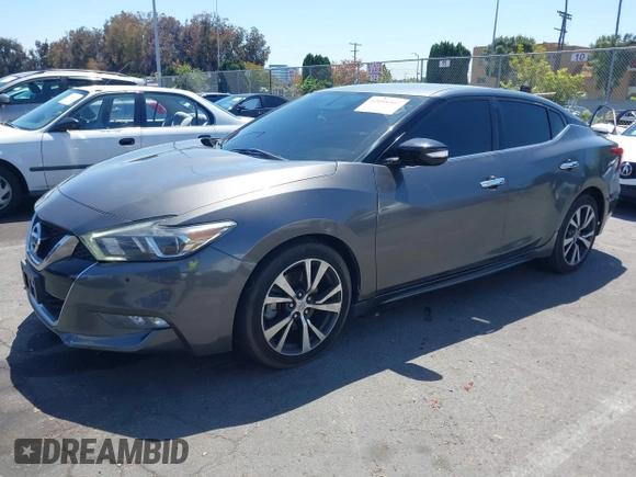 2018 Nissan Maxima Platinum z VIN 1N4AA6AP1JC388815, wystawiony jako IAAI lot #42098902 z przebiegiem 80 677 mil mil oraz . Historia ofert i sprzedaży dostępna na DreamBid. Obrazek 2.
