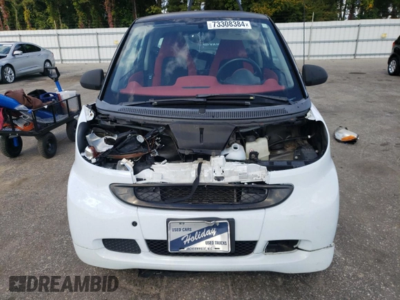 2011 Smart fortwo Pure with VIN WMEEJ3BAXBK447292, listed as a Copart auction lot 73308384 with 35,166 mi miles and Salvage title. Bid and sale history available at DreamBid. Image 5.