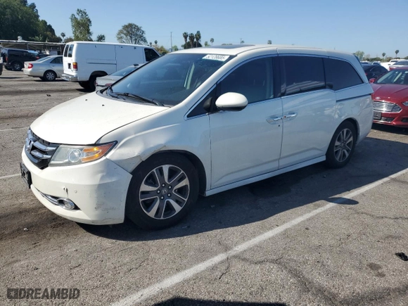 2015 Honda Odyssey Touring Elite with VIN 5FNRL5H97FB063296, listed as a Copart auction lot 52128685 with 120,416 mi miles and Salvage Title. Bid and sale history available at carsss.com. Image 1.
