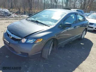 2010 Honda Civic Sdn DX-VP with VIN 2HGFA1F31AH571803, listed as a IAAI auction lot 41769105 with 57,187 mi miles. Bid and sale history available at carsss.com. Image 2.