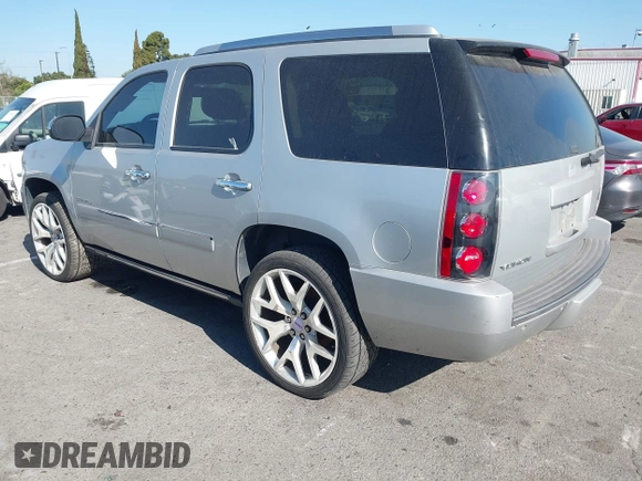 2011 GMC Yukon Denali with VIN 1GKS2EEF3BR350688, listed as a IAAI auction lot 41993776 with 241,941 mi miles. Bid and sale history available at carsss.com. Image 3.
