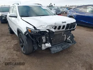 2019 Jeep Cherokee Latitude Plus with VIN 1C4PJMLB9KD453979, listed as a IAAI auction lot 41413997 with 70,664 mi miles and . Bid and sale history available at DreamBid. Image 6.