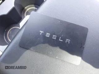 2023 Tesla Model Y Long Range with VIN 7SAYGDEE0PA111430, listed as a IAAI auction lot 42156924 with 35,950 mi miles and . Bid and sale history available at DreamBid. Image 11.