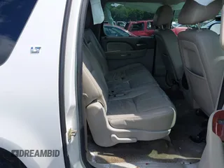 2014 Chevrolet Suburban LT with VIN 1GNSCJE07ER211222, listed as a IAAI auction lot 42428084 with 214,712 mi miles and . Bid and sale history available at DreamBid. Image 8.