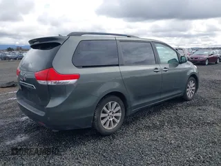 2011 Toyota Sienna XLE with VIN 5TDDK3DCXBS003666, listed as a IAAI auction lot 41807992 with 156,699 mi miles. Bid and sale history available at carsss.com. Image 4.