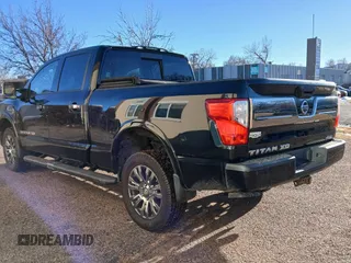 2017 Nissan Titan XD SL with VIN 1N6BA1F40HN561770, listed as a Copart auction lot 44038255 with 79,684 mi miles and Clean Title. Bid and sale history available at carsss.com. Image 3.