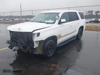 2019 Chevrolet Tahoe Commercial with VIN 1GNLCDEC4KR198330, listed as a IAAI auction lot 41542971 with 94,171 mi miles. Bid and sale history available at carsss.com. Image 2.