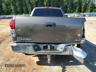 2008 Toyota Tundra 4WD Truck with VIN 5TBBV541X8S499448, listed as a Copart auction lot 69318414 with 253,204 mi miles and Salvage Title. Bid and sale history available at carsss.com. Image 6.