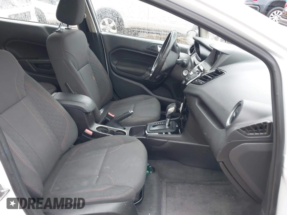 2016 Ford Fiesta SE with VIN 3FADP4EJ2GM157810, listed as a IAAI auction lot 41011326 with 214,609 mi miles. Bid and sale history available at carsss.com. Image 5.