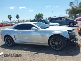 2014 Chevrolet Camaro LT z VIN 2G1FG1E30E9207699, wystawiony jako IAAI lot #42256519 z przebiegiem 107 219 mil mil oraz . Historia ofert i sprzedaży dostępna na DreamBid. Obrazek 13.