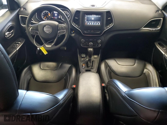 2020 Jeep Cherokee Latitude Plus с VIN 1C4PJMLB8LD565660, выставлен на аукционе Copart как лот 57408055 с пробегом 99 834 миль миль и Списание • Salvage title. История ставок и продаж доступна на DreamBid. Изображение 8.