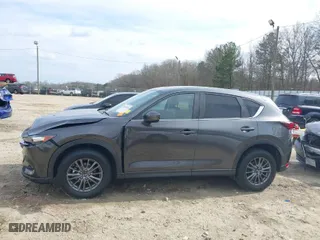 2017 Mazda CX-5 Touring with VIN JM3KFACLXH0125819, listed as a IAAI auction lot 41687038 with 101,769 mi miles. Bid and sale history available at carsss.com. Image 14.