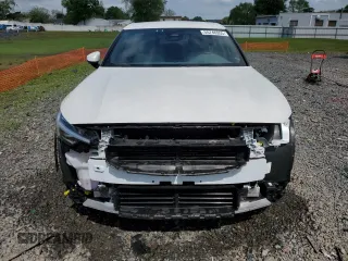 2024 Polestar 2 z VIN YSMFD3KA4RL223132, wystawiony jako Copart lot #55746955 z przebiegiem 6101 mil mil oraz Szkody całkowita. Historia ofert i sprzedaży dostępna na DreamBid. Obrazek 5.