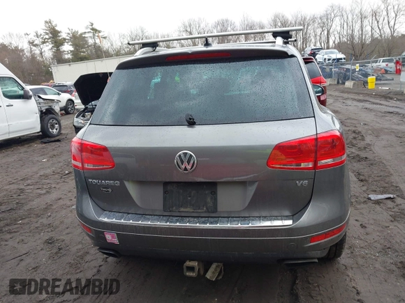 2013 Volkswagen Touareg Lux with VIN WVGEF9BP0DD005082, listed as a IAAI auction lot 41667026 with 140,148 mi miles and . Bid and sale history available at DreamBid. Image 17.
