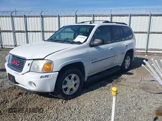 2006 GMC Envoy SLT with VIN 1GKDS13S062128531, listed as a IAAI auction lot 41458983 with 119,385 mi miles. Bid and sale history available at carsss.com. Image 17.