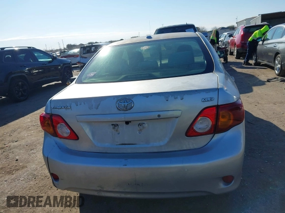 2009 Toyota Corolla with VIN JTDBL40E999021621, listed as a IAAI auction lot 41636462 with 123,650 mi miles. Bid and sale history available at carsss.com. Image 16.