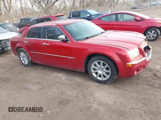 2008 Chrysler 300 C Hemi with VIN 2C3KA63H58H140583, listed as a IAAI auction lot 41448613 with 113,707 mi miles. Bid and sale history available at carsss.com. Image 1.