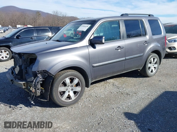 2014 Honda Pilot Touring with VIN 5FNYF4H95EB019048, listed as a IAAI auction lot 41526958 with 172,252 mi miles and . Bid and sale history available at DreamBid. Image 2.