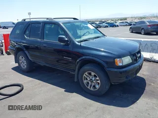 2004 Isuzu Rodeo S z VIN 4S2CK58YX44311680, wystawiony jako IAAI lot #42476361 z przebiegiem 154 693 mil mil oraz . Historia ofert i sprzedaży dostępna na DreamBid. Obrazek 1.