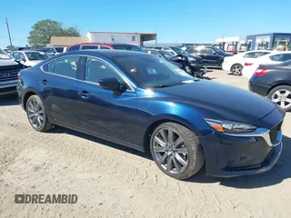 2021 Mazda 6 Grand Touring with VIN JM1GL1TY3M1619771, listed as a IAAI auction lot 40964809 with 25,816 mi miles. Bid and sale history available at carsss.com. Image 1.