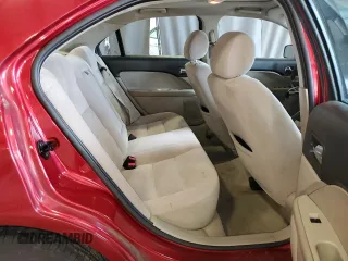 2006 Ford Fusion SE with VIN 3FAFP07Z76R219711, listed as a Copart auction lot 53355135 with 153,722 mi miles and Salvage Title. Bid and sale history available at DreamBid. Image 10.