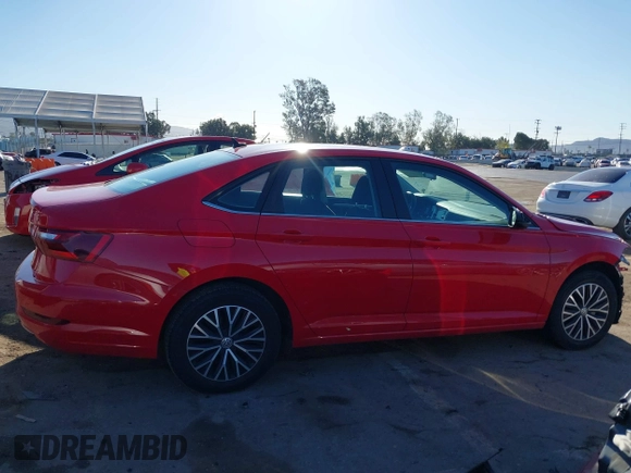 2021 Volkswagen Jetta S z VIN 3VWC57BU9MM022263, wystawiony jako IAAI lot #41817483 z przebiegiem 87 556 mil mil oraz . Historia ofert i sprzedaży dostępna na DreamBid. Obrazek 14.