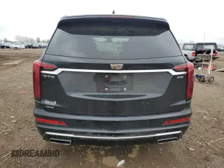2022 Cadillac XT6 Premium Luxury z VIN 1GYKPFRS9NZ103281, wystawiony jako Copart lot #55118485 z przebiegiem 52 413 mil mil oraz Szkoda całkowita • Salvage title. Historia ofert i sprzedaży dostępna na DreamBid. Obrazek 6.