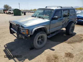 1999 Jeep Cherokee Sport with VIN 1J4FF68S1XL655059, listed as a Copart auction lot 52255975 with 0 mi miles and Salvage Title. Bid and sale history available at carsss.com. Image 1.