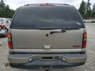 2002 GMC Yukon Denali z VIN 1GKEK63U82J224913, wystawiony jako Copart lot #60664885 z przebiegiem 208 794 mil mil oraz Szkoda całkowita • Salvage title. Historia ofert i sprzedaży dostępna na DreamBid. Obrazek 6.