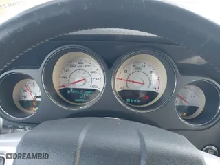 2013 Dodge Challenger R/T with VIN 2C3CDYBT6DH733845, listed as a IAAI auction lot 41090619 with 138,886 mi miles. Bid and sale history available at carsss.com. Image 7.